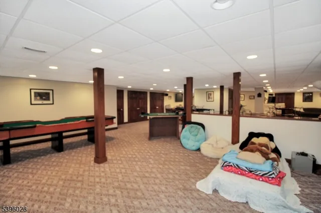 a living room with furniture and a table