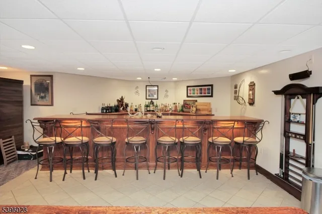 a dinning table and chairs in a room