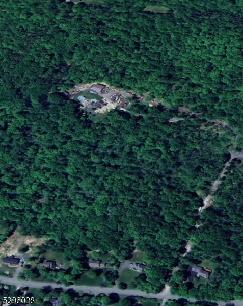 87 Walnut Valley Road Blairstown, NJ 07832 - Photo 33 of 33 a view of a house in a forest