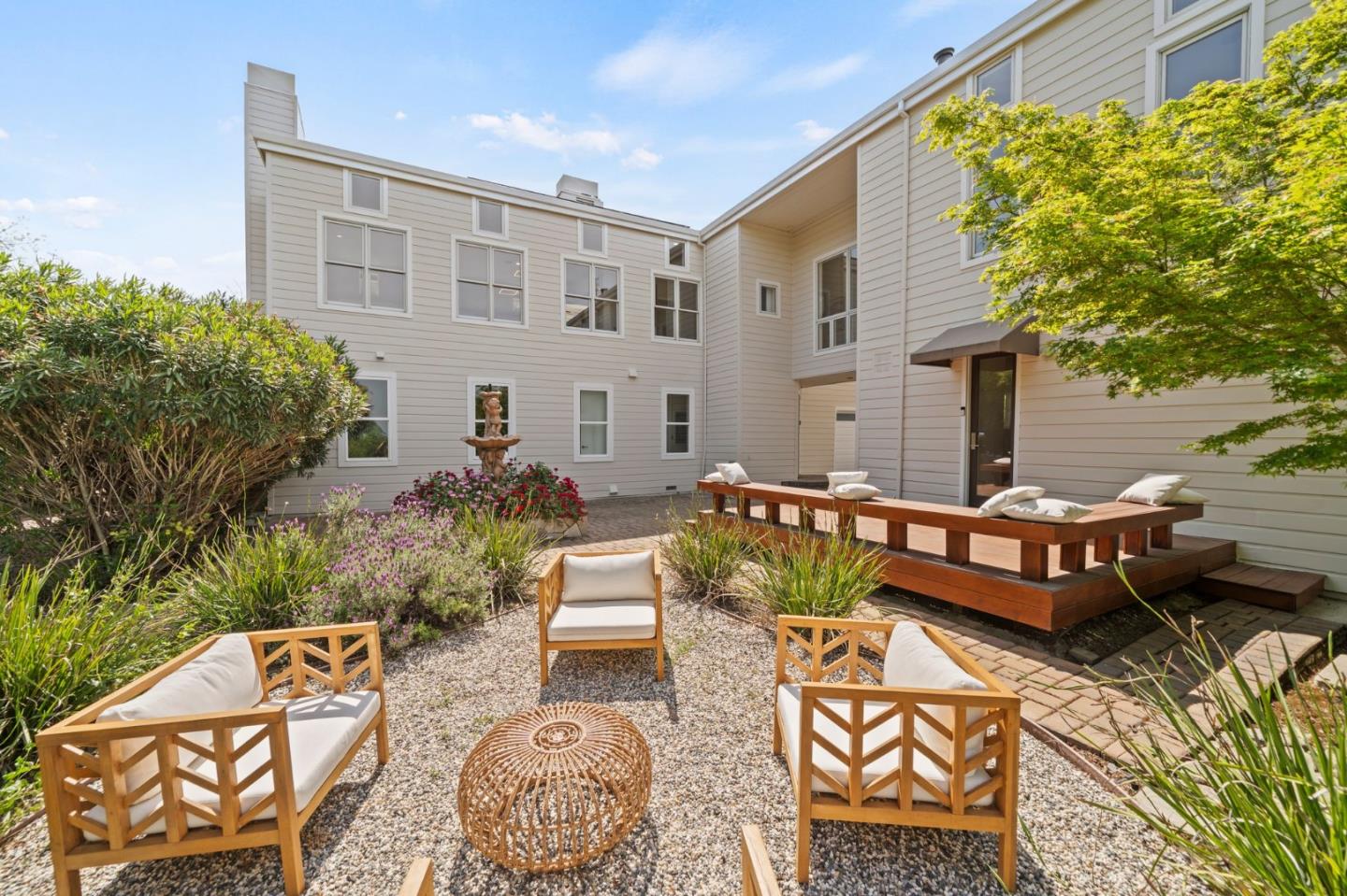 2698 Greenrock Road Milpitas, CA 95035 - Photo 71 of 99 a view of a patio with couches table and chairs and potted plants