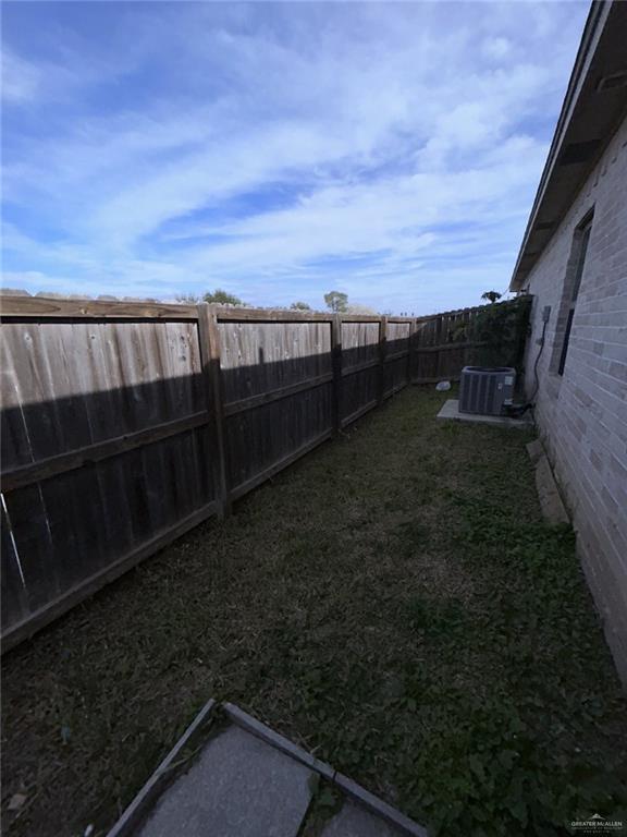 2100 Jackson Street, Unit 1 Weslaco, TX 78599 - Photo 3 of 13 a view of a backyard of the house