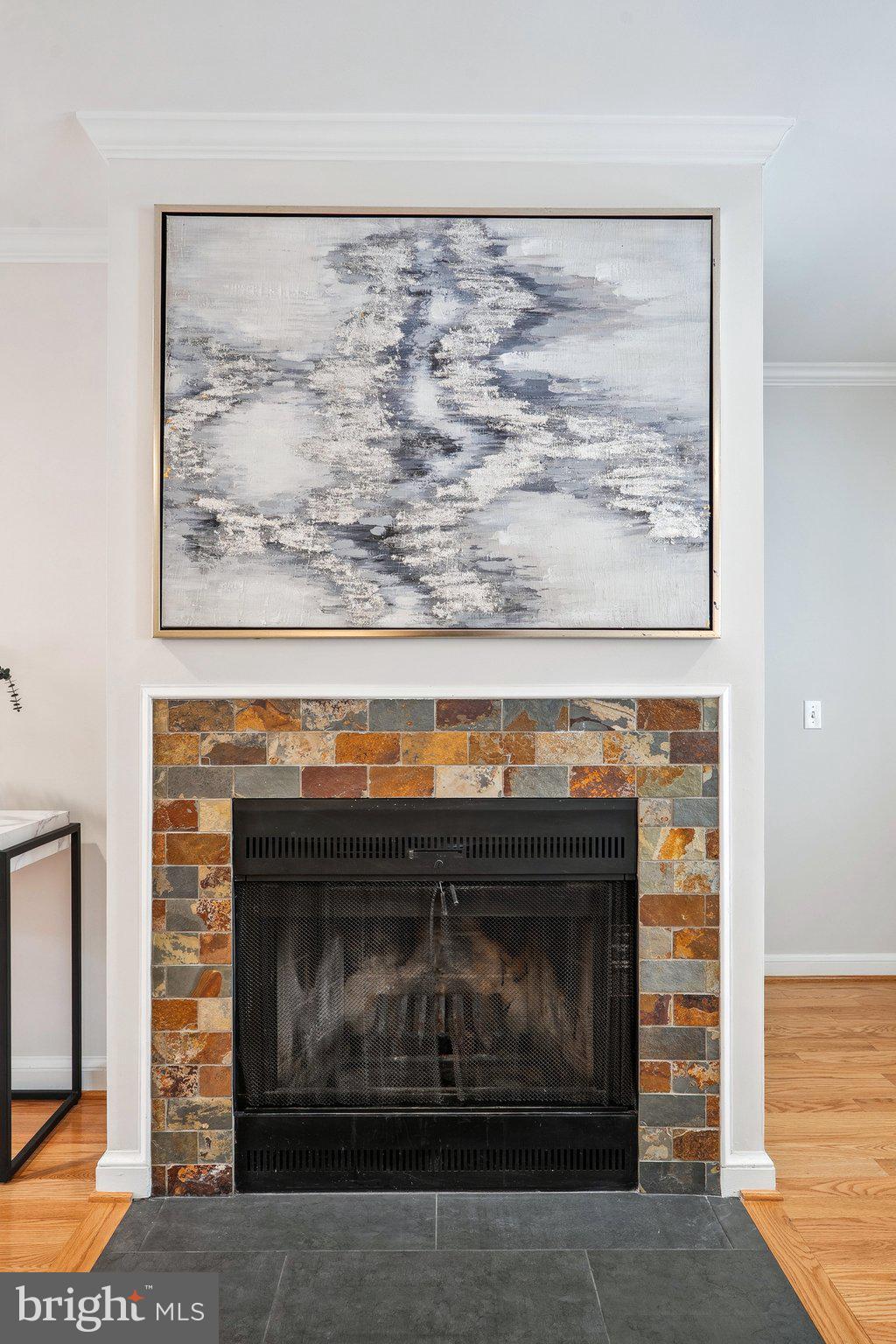 6861 Washington Boulevard Arlington, VA 22213 - Photo 11 of 28 a fireplace with a wall in it