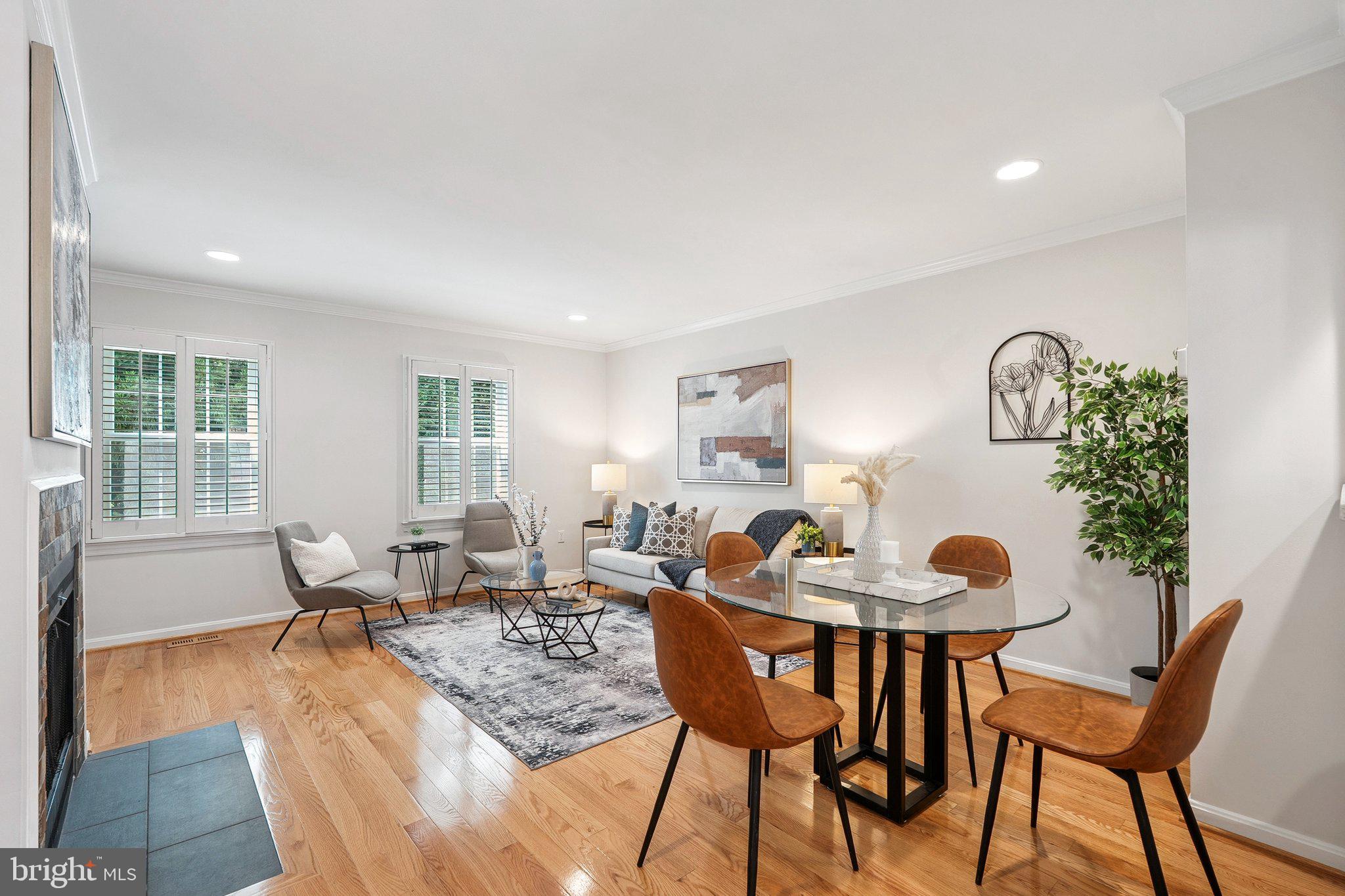 6861 Washington Boulevard Arlington, VA 22213 - Photo 7 of 28 a living room with furniture and wooden floor