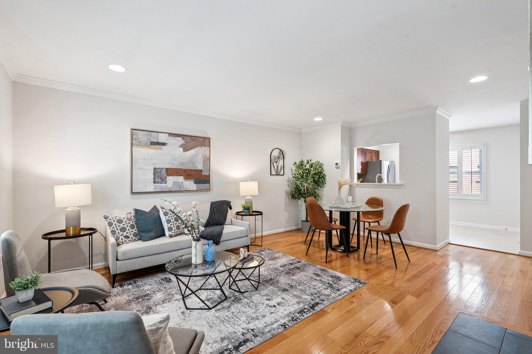 6861 Washington Boulevard Arlington, VA 22213 - Photo 8 of 28 a living room with furniture and wooden floor