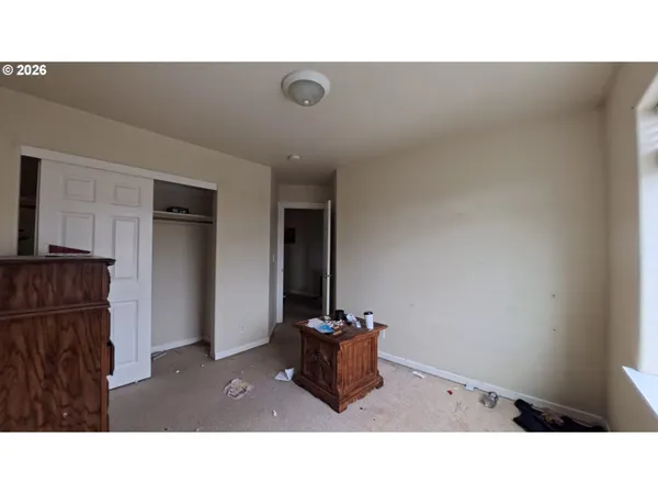 a living room with furniture and window