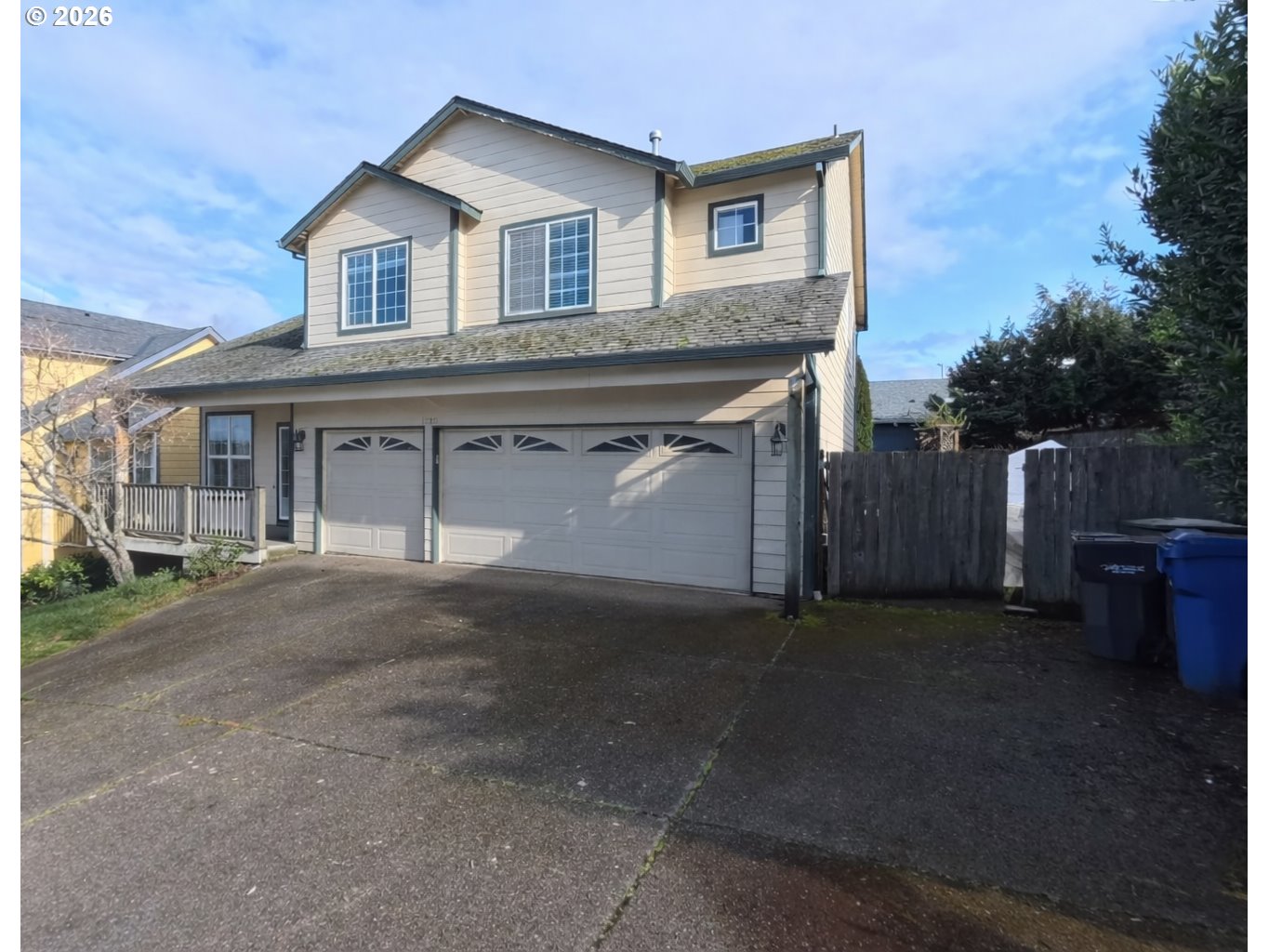 2180 Dalke Ridge Drive Northwest Salem, OR 97304 - Photo 2 of 29 a front view of a house with a garage and a yard