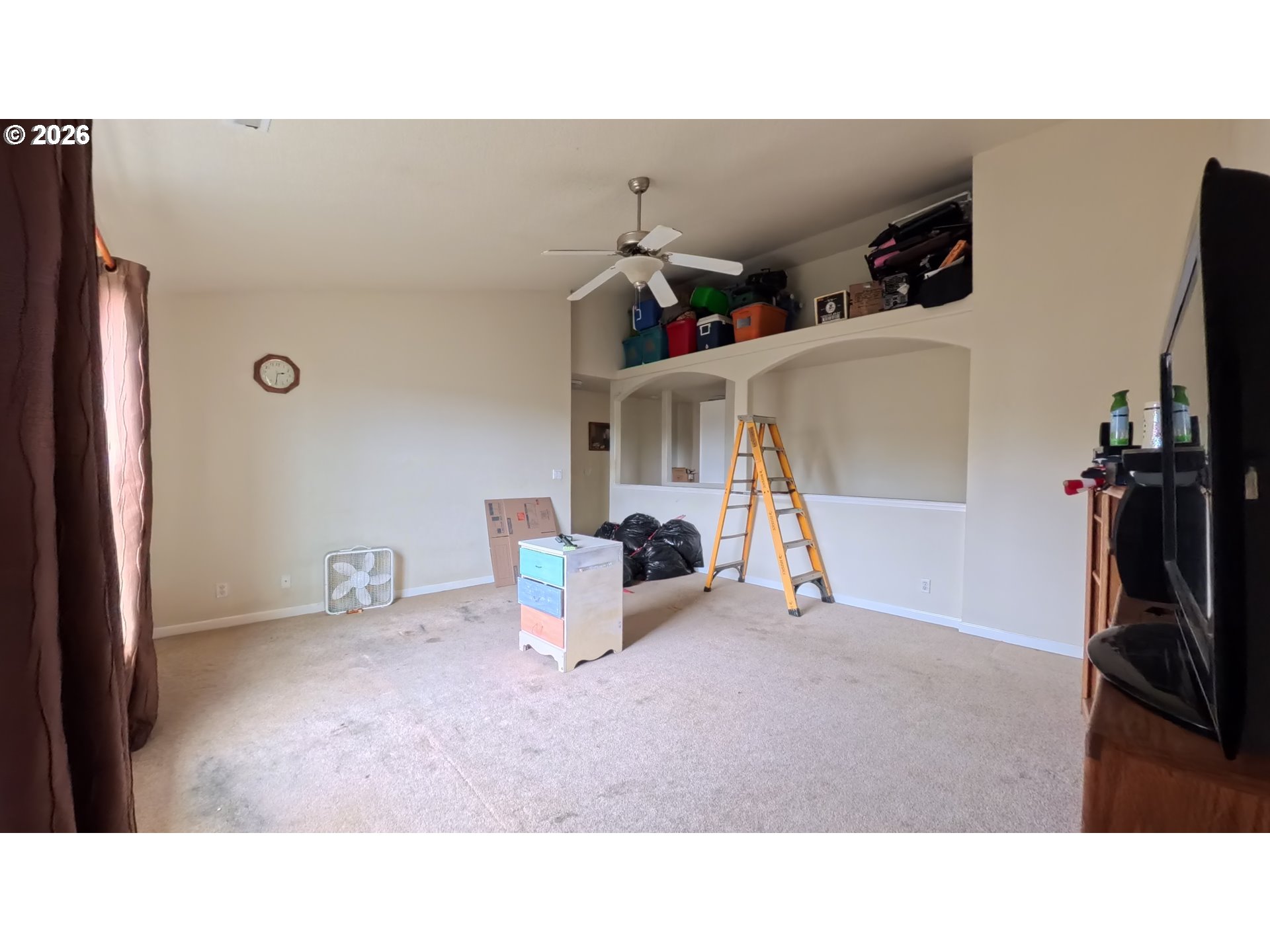 2180 Dalke Ridge Drive Northwest Salem, OR 97304 - Photo 22 of 29 a living room with furniture and a flat screen tv