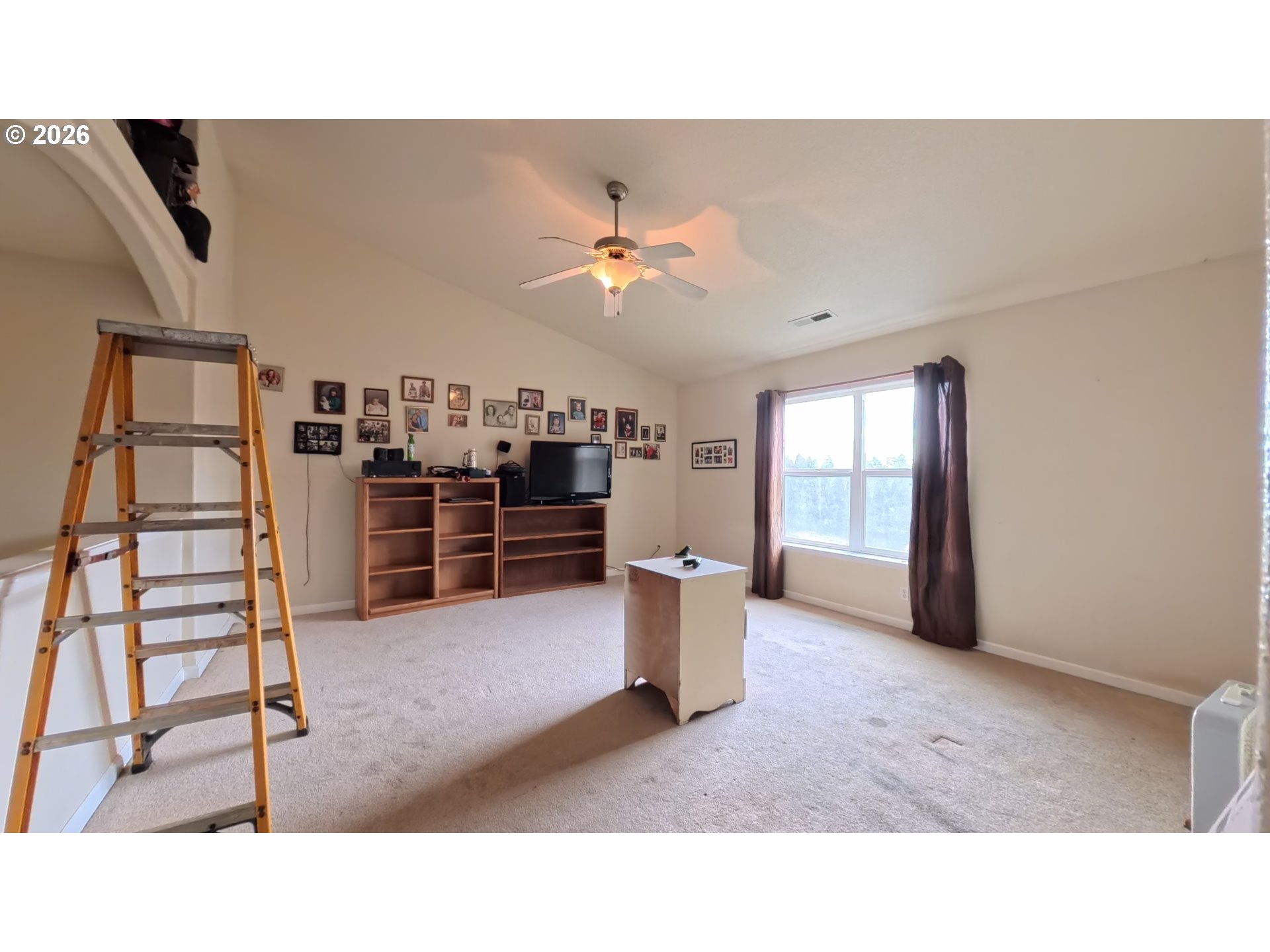 2180 Dalke Ridge Drive Northwest Salem, OR 97304 - Photo 23 of 29 a living room with furniture a kitchen view and appliances