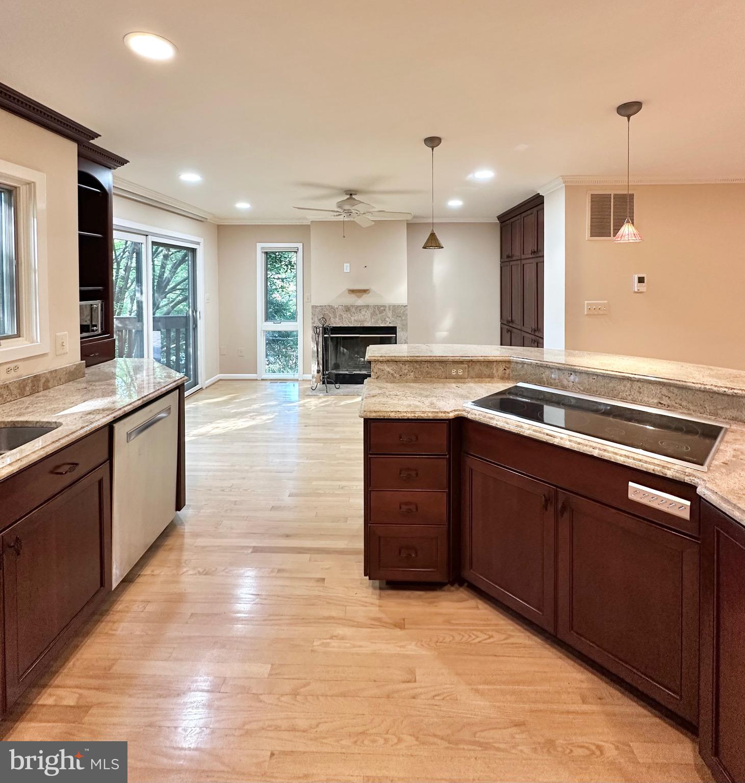 2021 Lakebreeze Way Reston, VA 20191 - Photo 13 of 51 a large kitchen with kitchen island a sink stainless steel appliances and cabinets