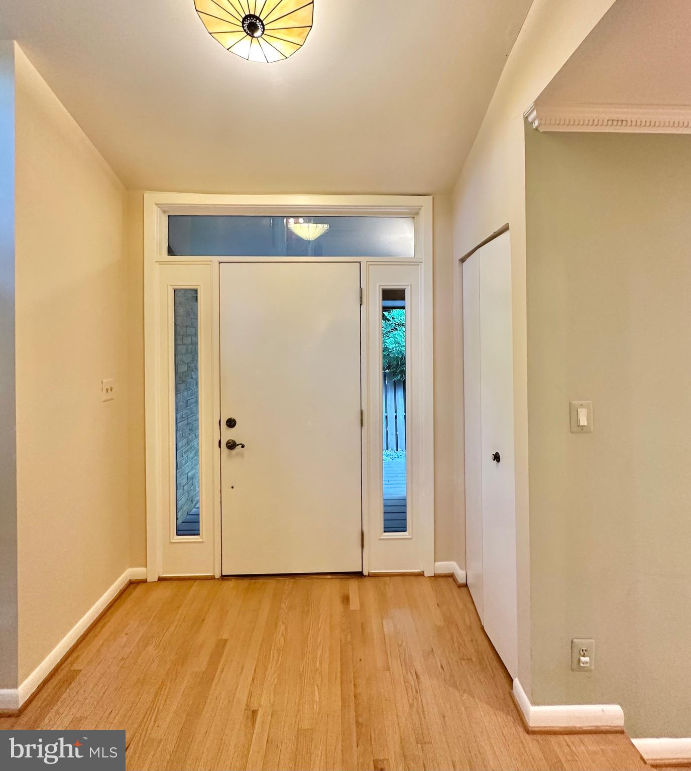 2021 Lakebreeze Way Reston, VA 20191 - Photo 19 of 51 a view of an empty room with wooden floor and a window