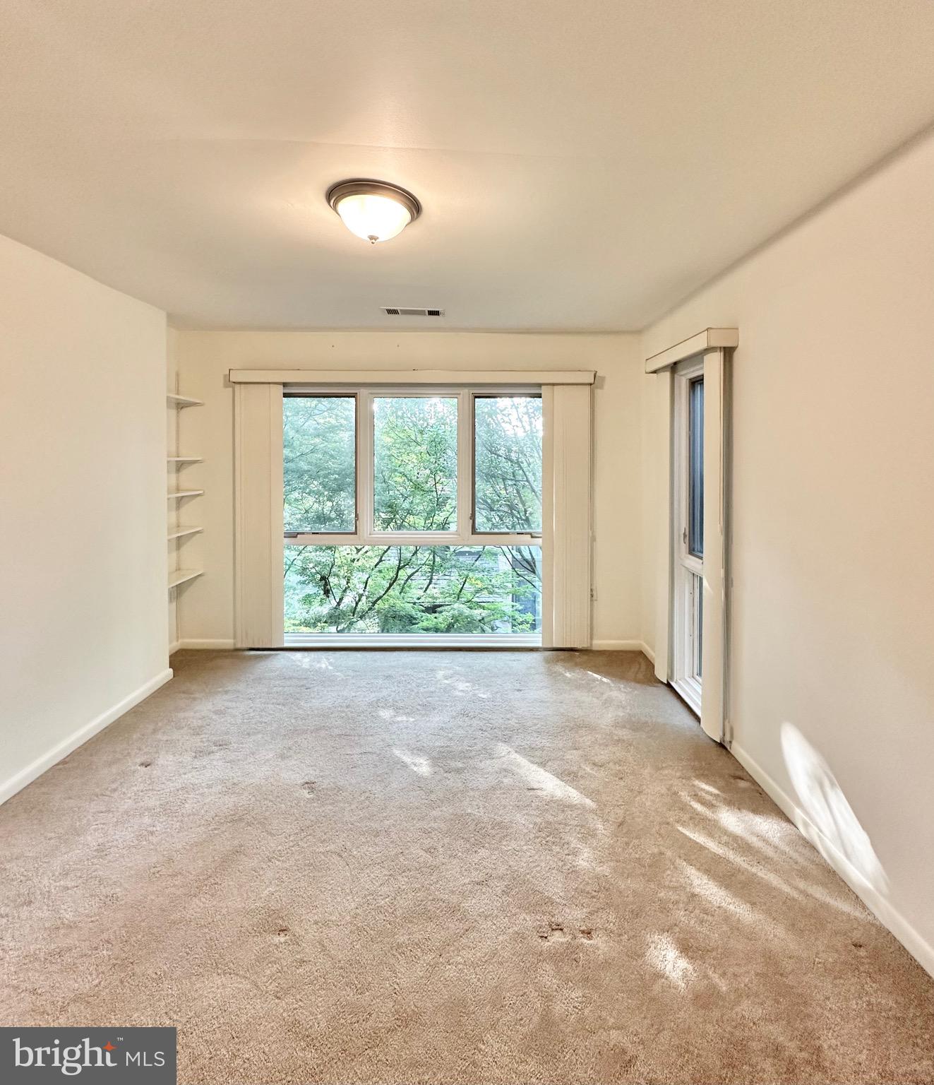 2021 Lakebreeze Way Reston, VA 20191 - Photo 31 of 51 a view of a room with a large window