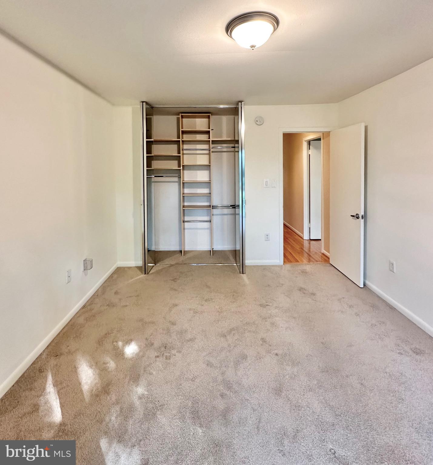 2021 Lakebreeze Way Reston, VA 20191 - Photo 32 of 51 an empty room with windows and closet