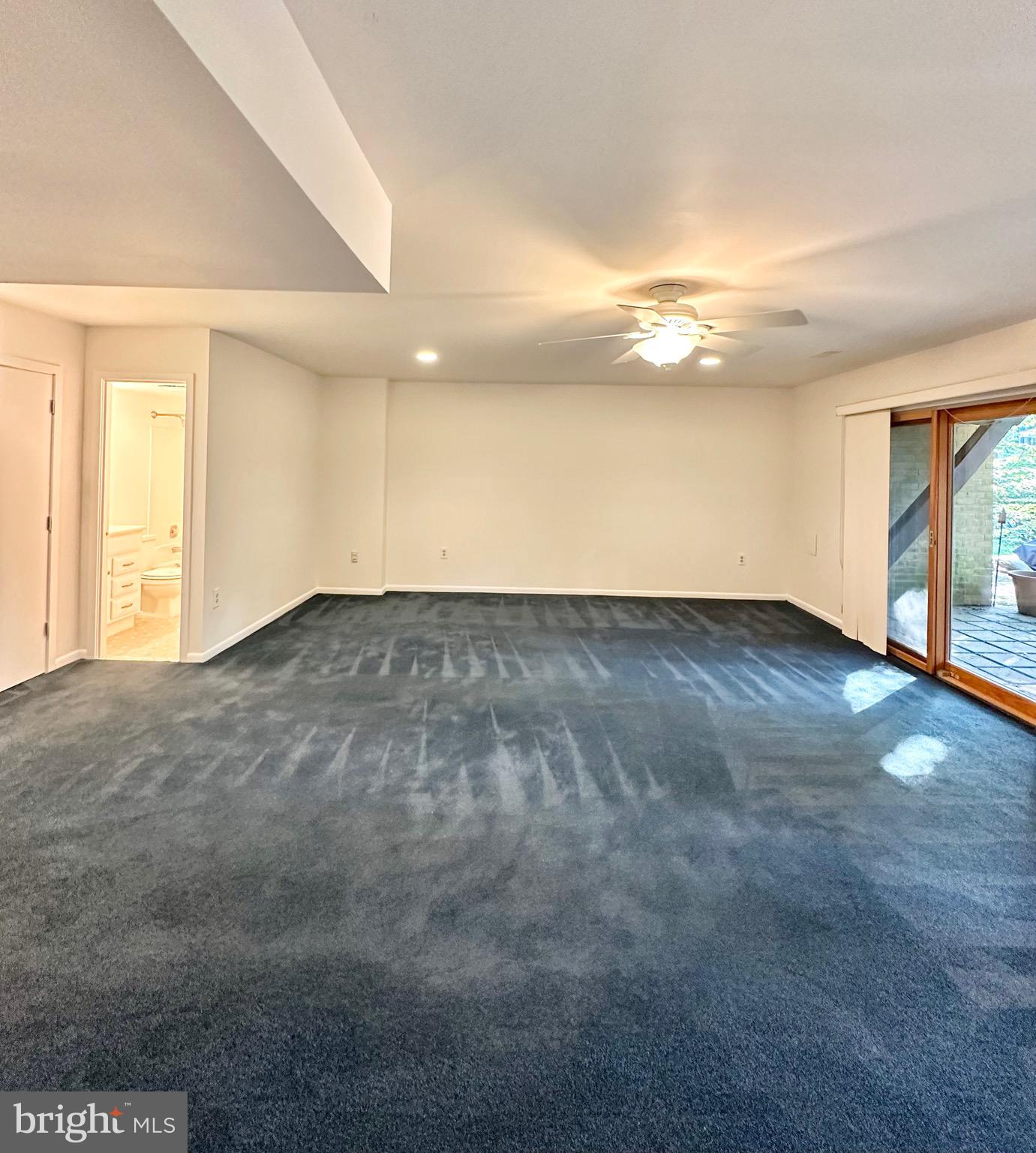 2021 Lakebreeze Way Reston, VA 20191 - Photo 41 of 51 an empty room with wooden floor and windows