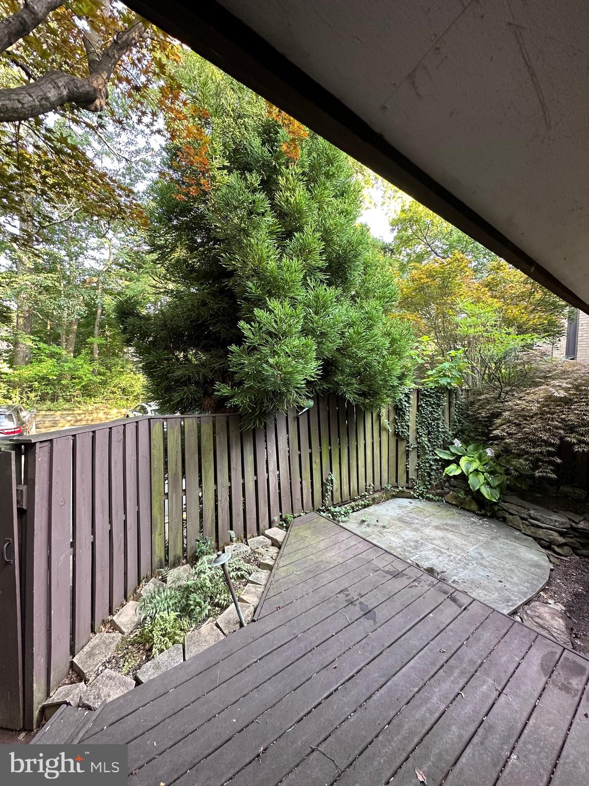 2021 Lakebreeze Way Reston, VA 20191 - Photo 5 of 51 a wooden deck with sunset view