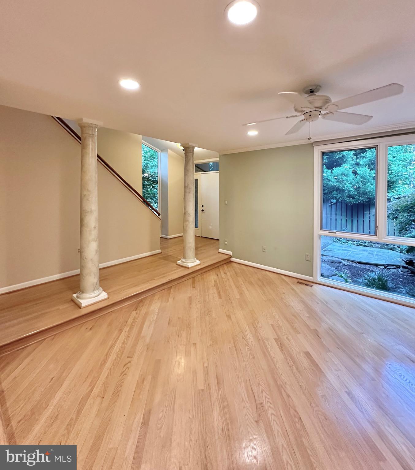 2021 Lakebreeze Way Reston, VA 20191 - Photo 8 of 51 wooden floor in an empty room with a window