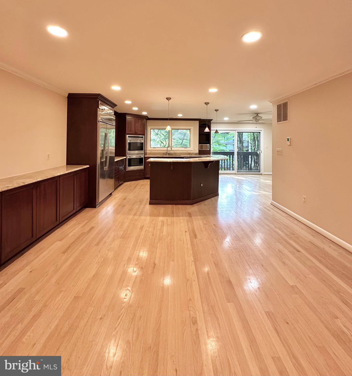 2021 Lakebreeze Way Reston, VA 20191 - Photo 9 of 51 a view of kitchen with kitchen island and stainless steel appliances