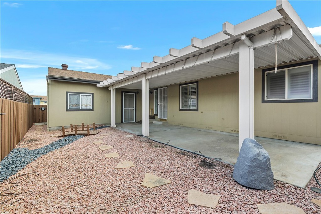 27250 Murrieta Road, Unit 253 Menifee, CA 92586 - Photo 43 of 49 Patio and Backyard with pet ramp to pet door