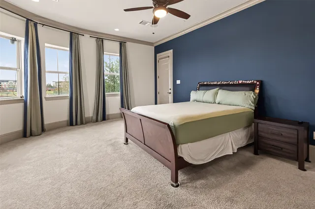 a bedroom with a bed and a table