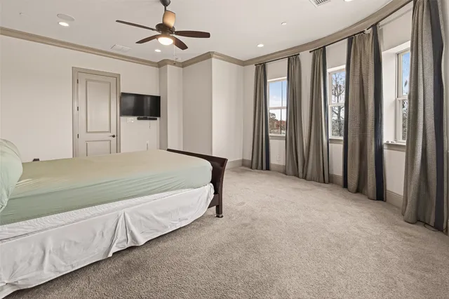 a spacious bathroom with a double vanity sink a mirror and a bathtub