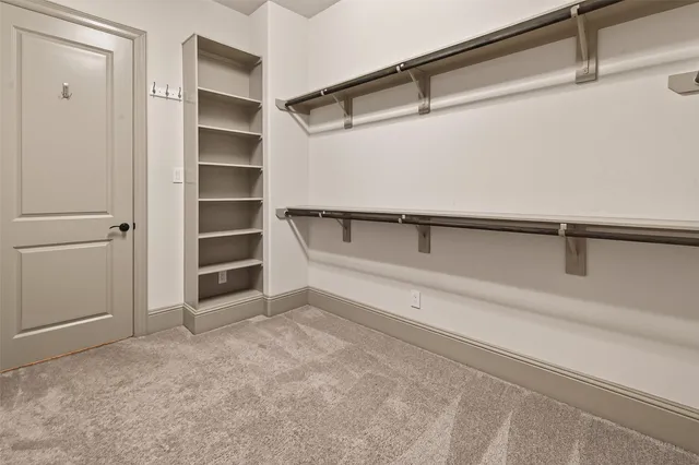 a balcony with a plant in front of it