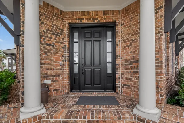 a view of a door and outdoor space