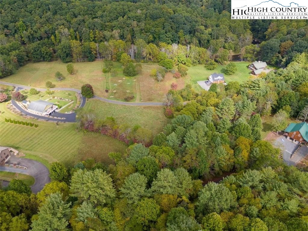 Stoney Brook Drive Lansing, NC 28643 - Photo 11 of 25 a view of a lake with a yard
