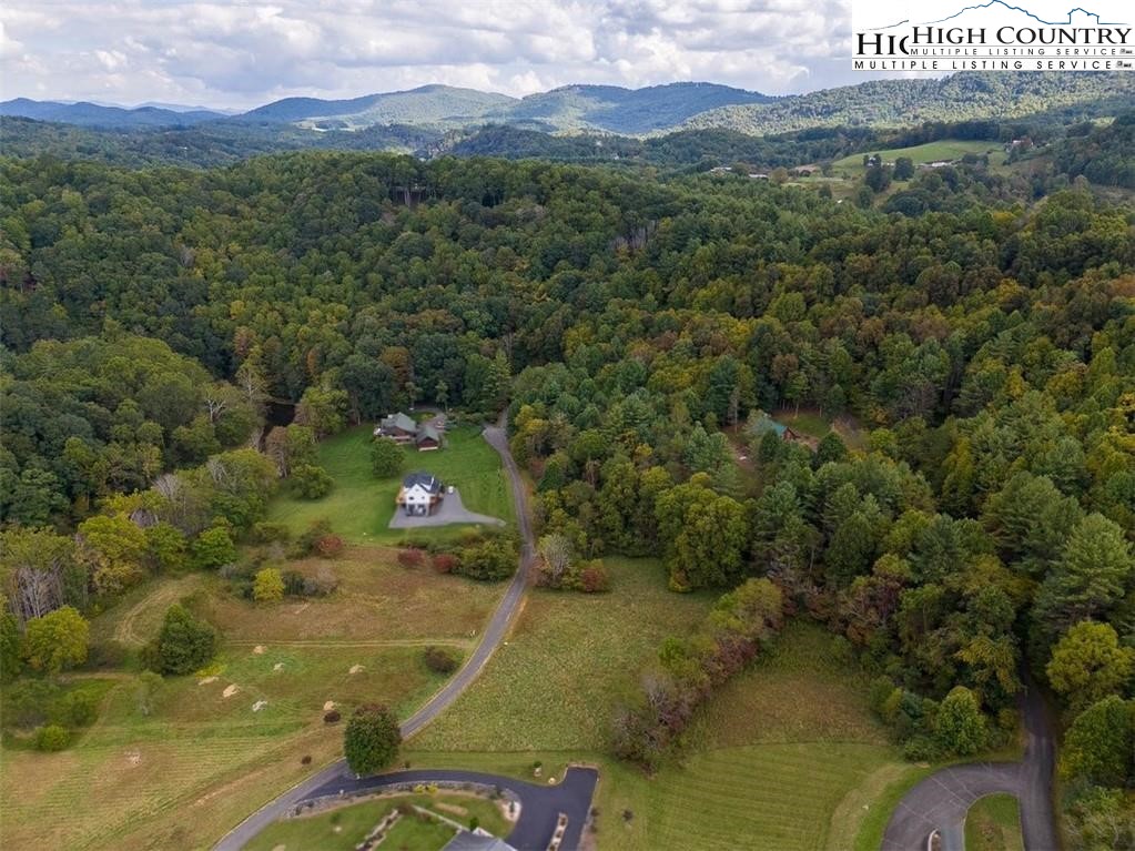 Stoney Brook Drive Lansing, NC 28643 - Photo 18 of 25 a view of a town with mountains in the background