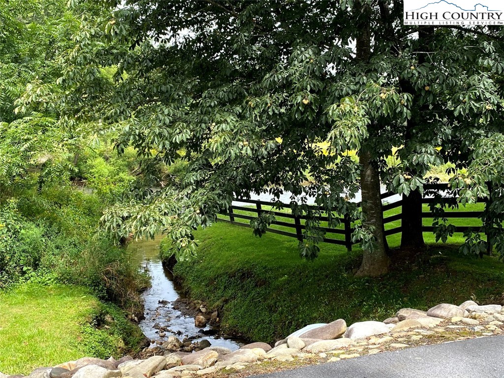 Stoney Brook Drive Lansing, NC 28643 - Photo 25 of 25 a garden with trees in the background