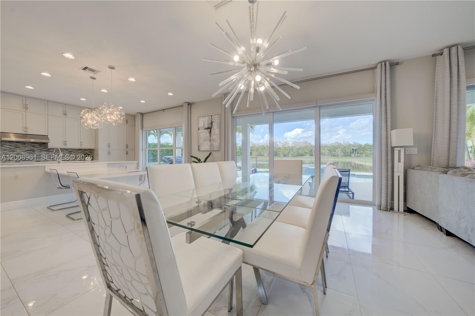 11655 Windy Frst Way Boca Raton, FL 33498 - Photo 17 of 47 a view of a dining room and livingroom view
