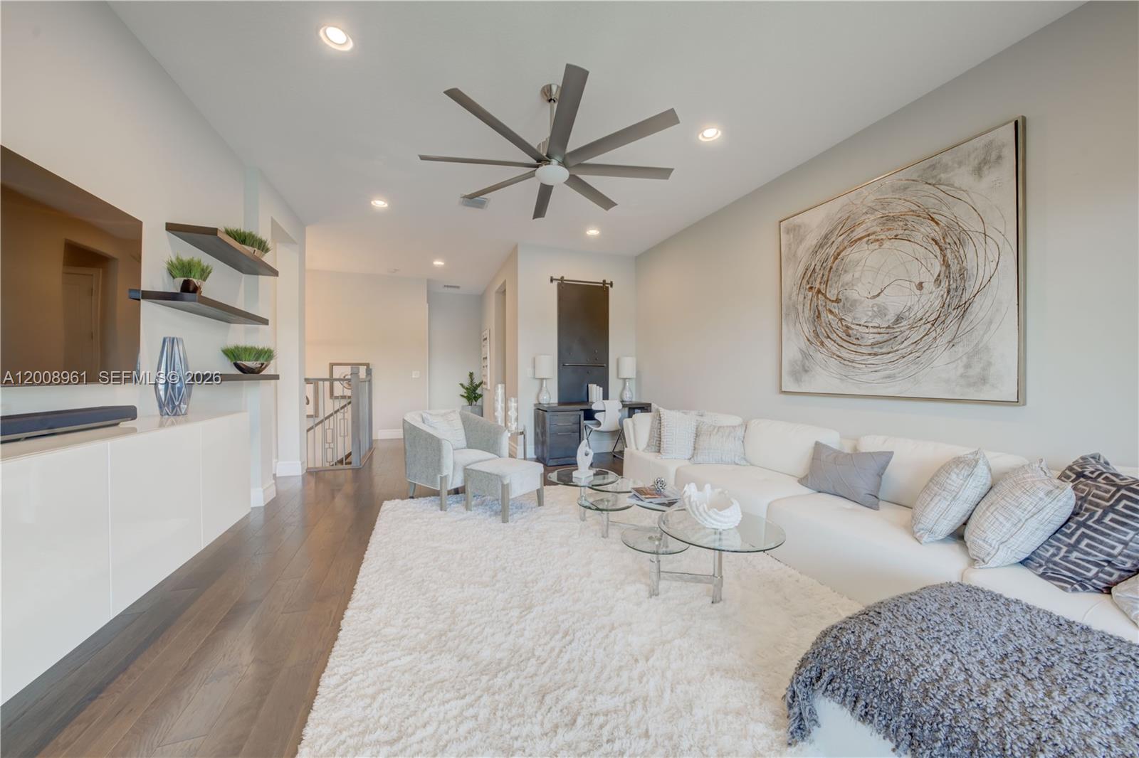 11655 Windy Frst Way Boca Raton, FL 33498 - Photo 29 of 47 a living room with furniture a view of bedroom and a couch