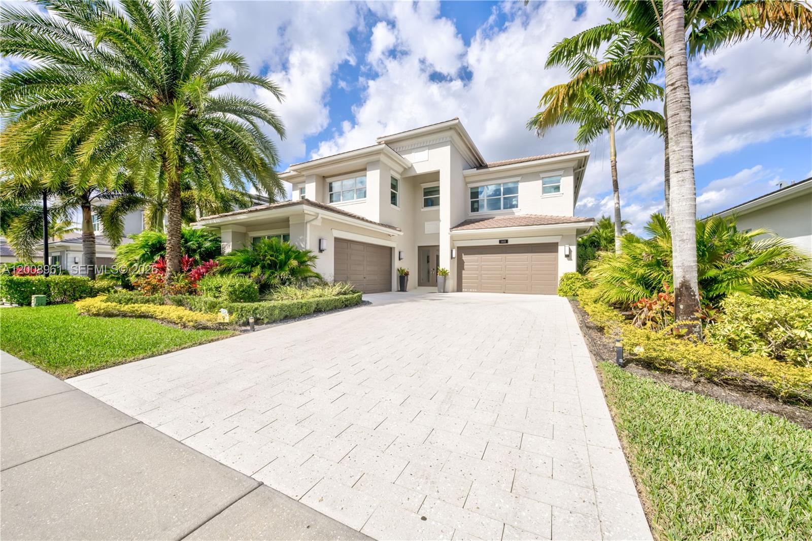 11655 Windy Frst Way Boca Raton, FL 33498 - Photo 44 of 47 a front view of a house with a garden