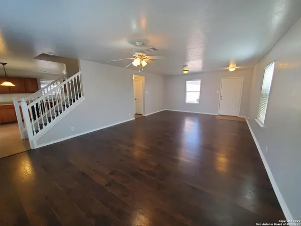 a view of an entryway with wooden floor