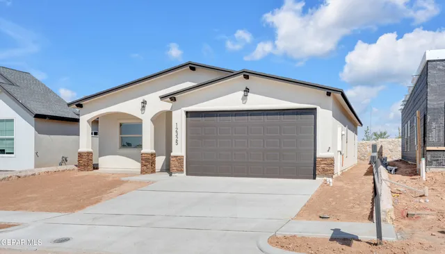 a view of a house with a patio