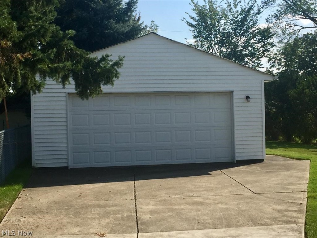 13812 Granger Road Cleveland, OH 44125 - Photo 5 of 29 You'll appreciate this fabulous two-car garage with a single double entry door and a service door to the side.