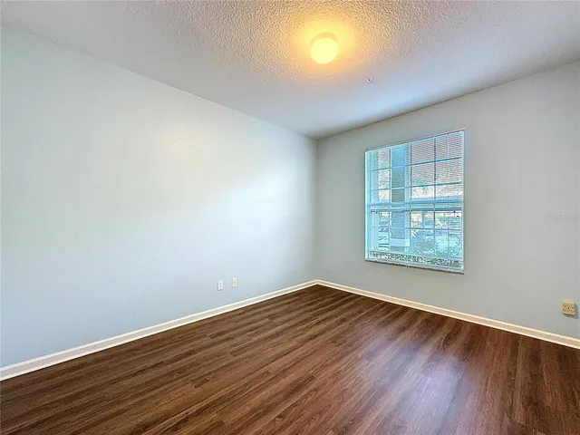 a kitchen that has a sink and cabinets