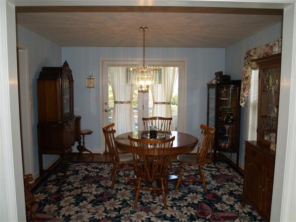 80 Stonegate Road Chelmsford, MA 01824 - Photo 5 of 20 a dining room with furniture and window