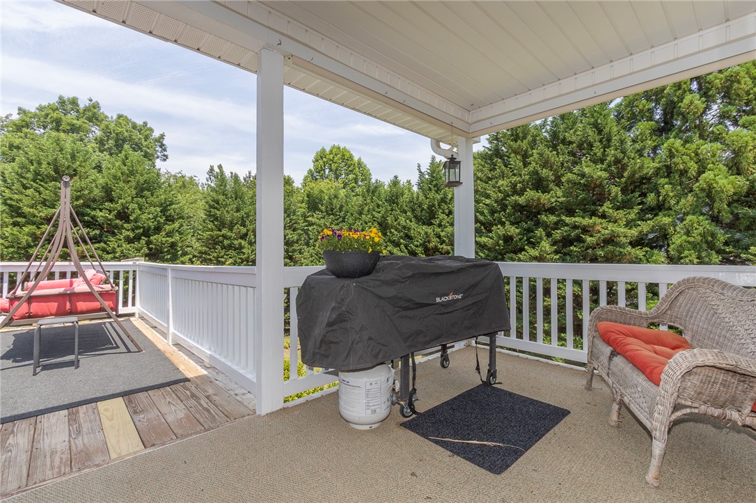 861 North Old Pendleton Road Liberty, SC 29657 - Photo 32 of 45 An inviting covered deck overlooks a private, wooded backyard oasis, perfect for tranquil relaxation or lively entertaining.