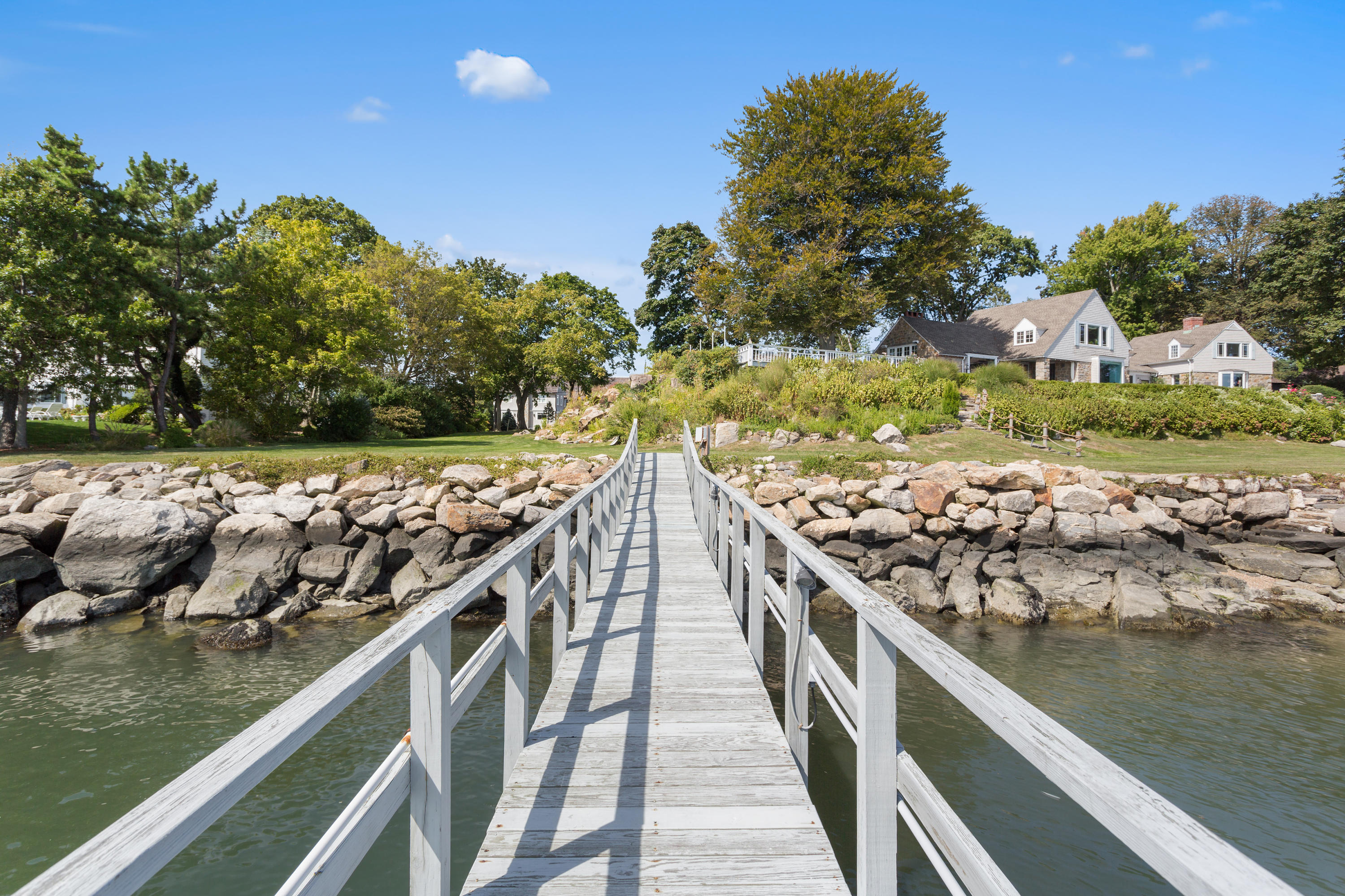 16 Nathan Hale Drive Norwalk, CT 06854 - Photo 1 of 29 a view of a wooden bridge