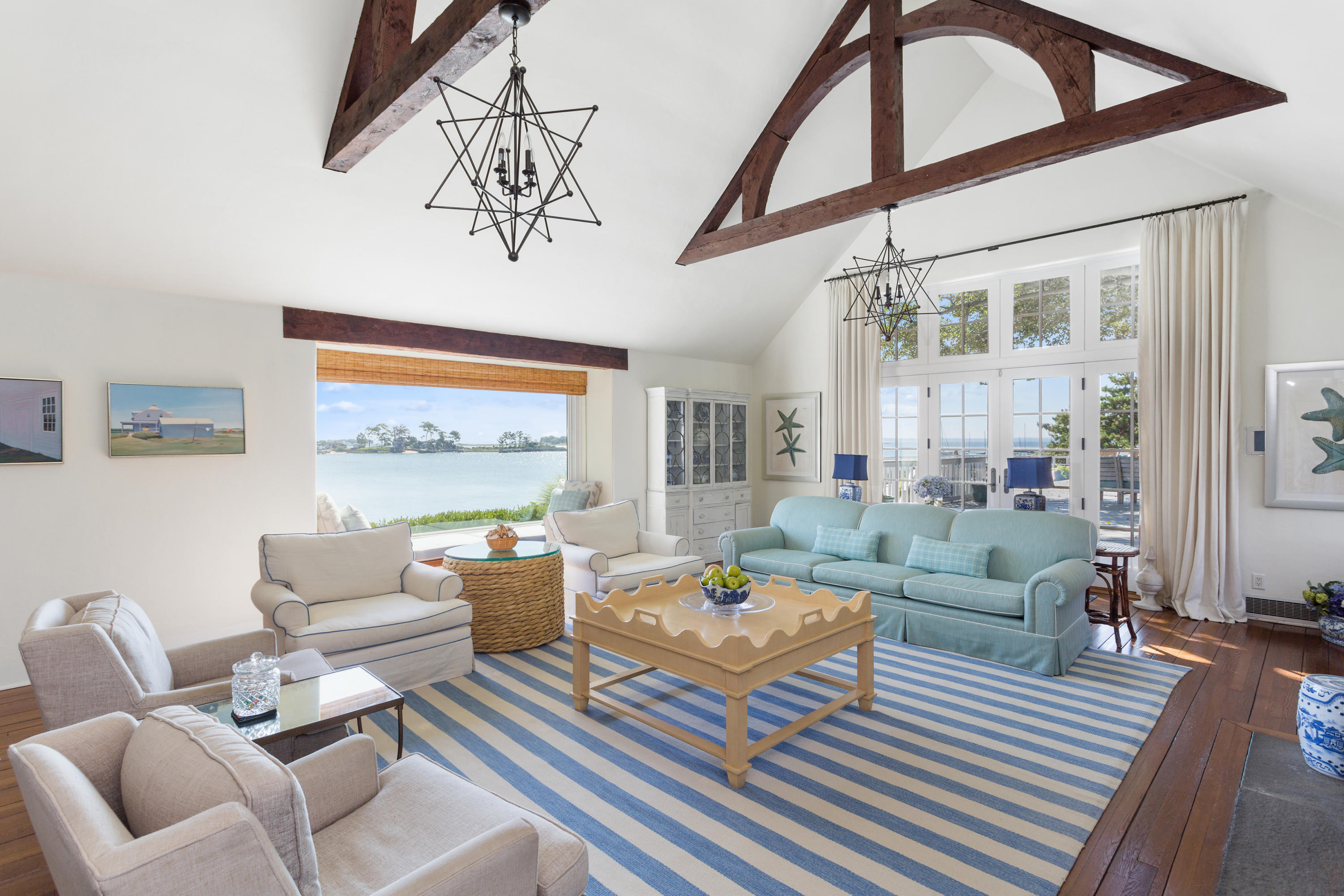 16 Nathan Hale Drive Norwalk, CT 06854 - Photo 4 of 29 a living room with furniture and a large window