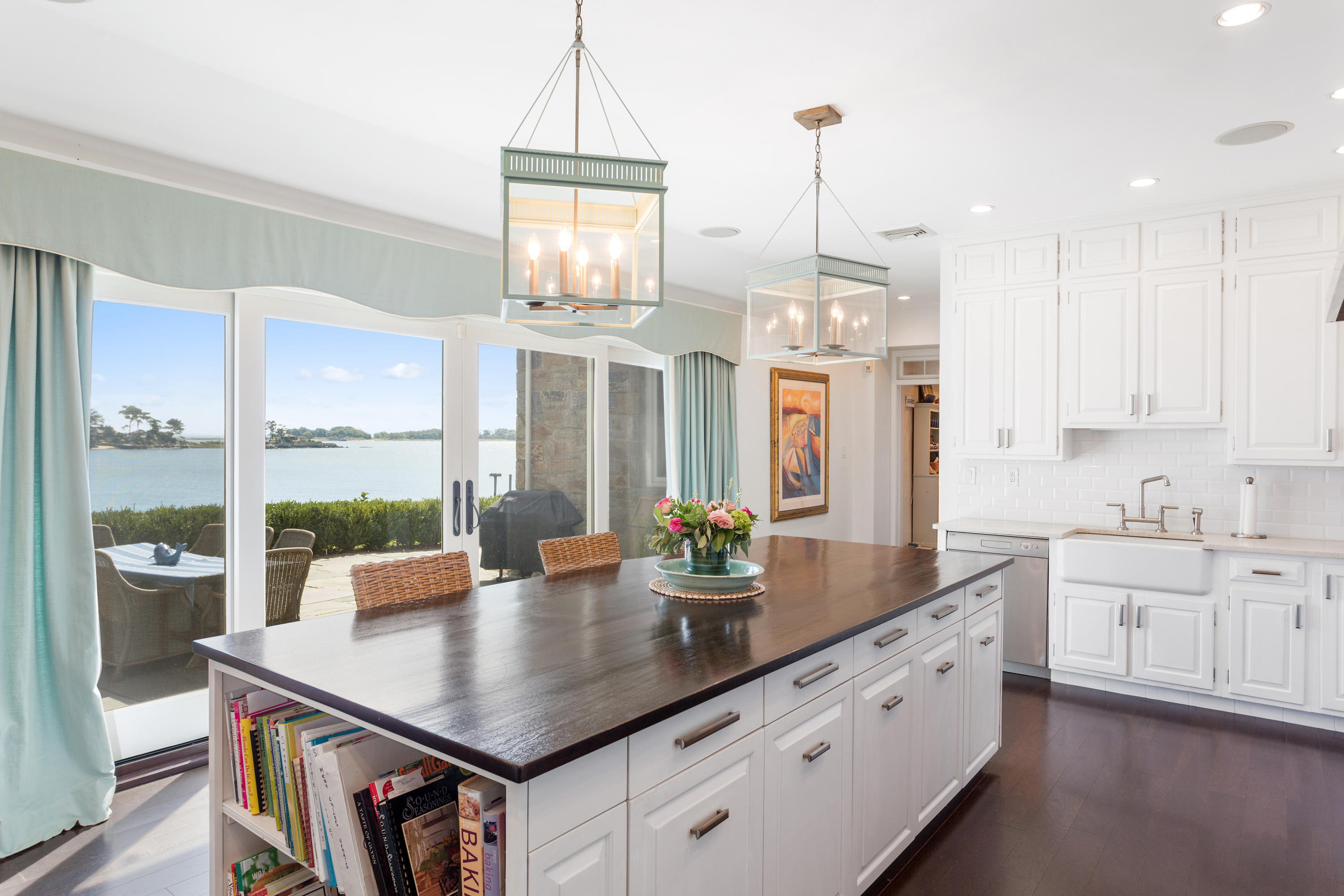 16 Nathan Hale Drive Norwalk, CT 06854 - Photo 6 of 29 a kitchen with stainless steel appliances granite countertop a sink a stove and white cabinets