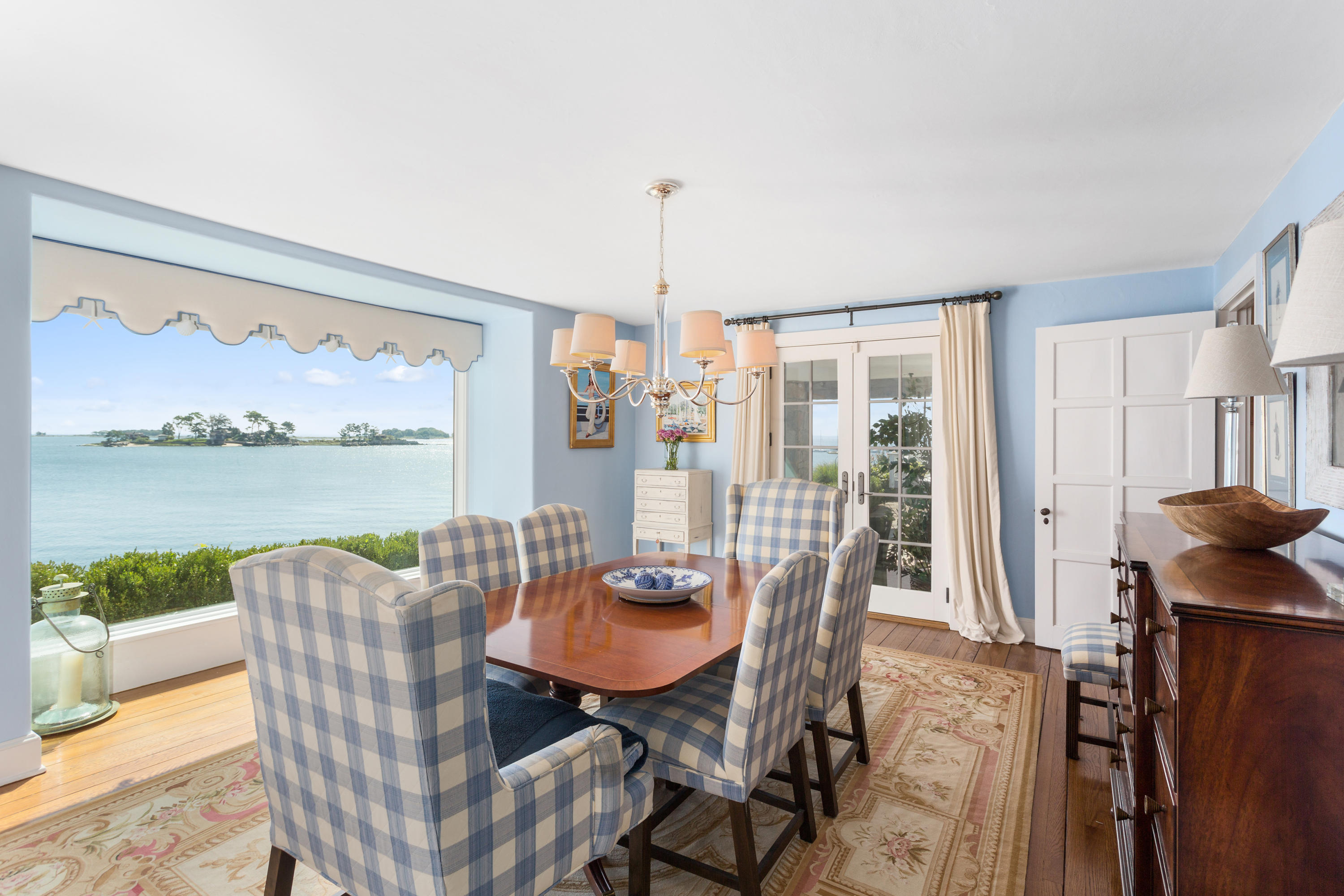 16 Nathan Hale Drive Norwalk, CT 06854 - Photo 8 of 29 a dining room with furniture a rug and wooden floor