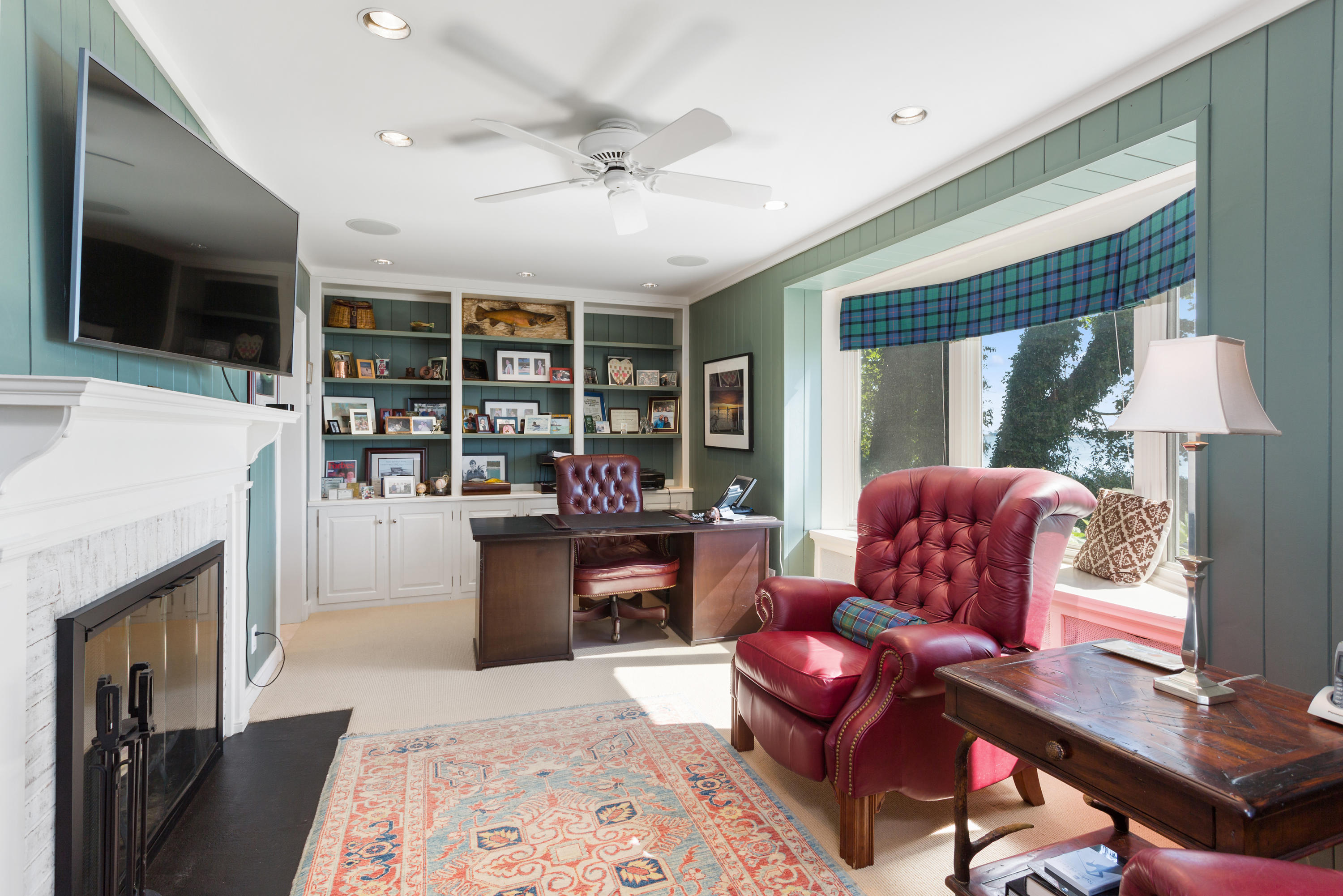 16 Nathan Hale Drive Norwalk, CT 06854 - Photo 10 of 29 a living room with furniture and a fireplace