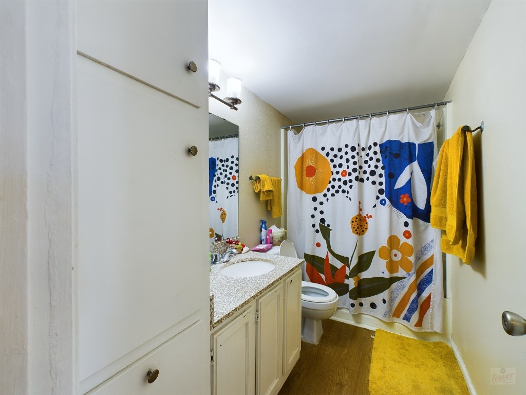 1000 West 26th Street, Unit 118 Austin, TX 78705 - Photo 14 of 18 a view of walk in closet with clothes and shoes