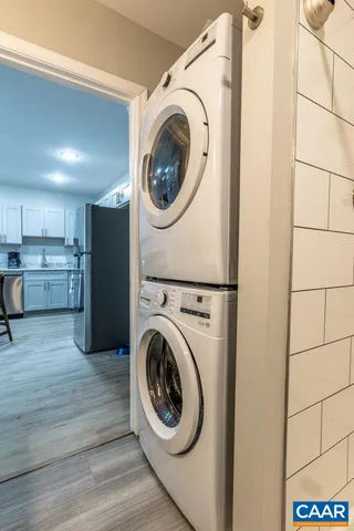a view of a kitchen with washer and dryer