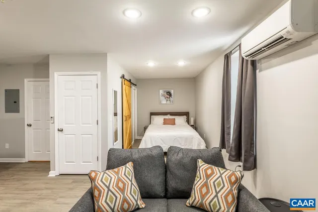 a room with furniture and a wooden floor