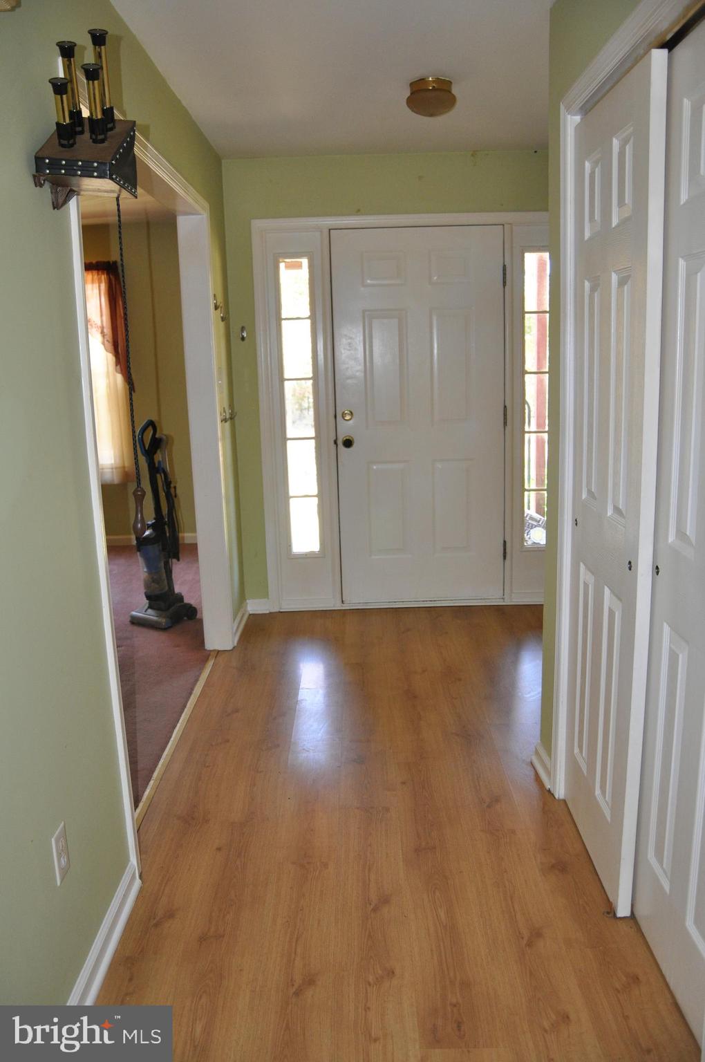 644 Russell Mill Road Swedesboro, NJ 08085 - Photo 3 of 39 a view of a hallway with wooden floor