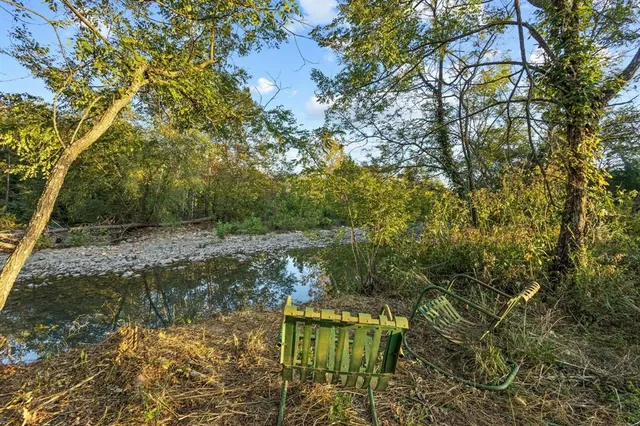 a view of a lake with beach
