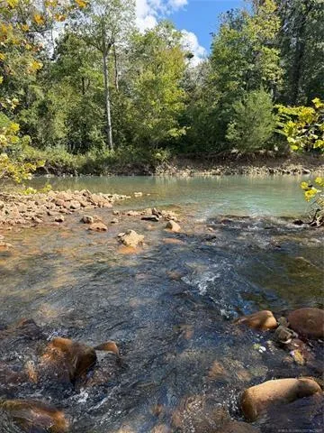 a view of mountain with lake view