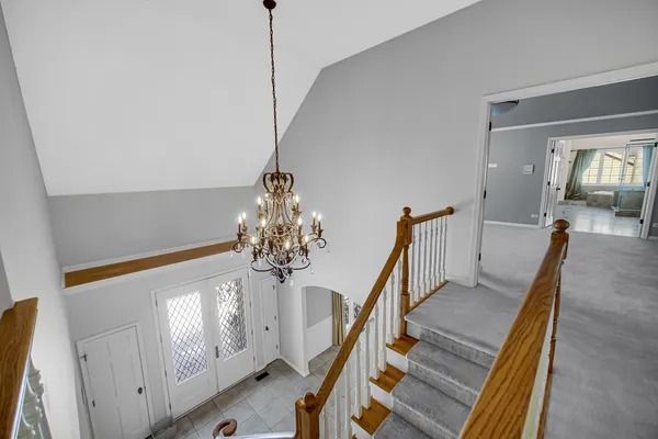 a view of hallway with stairs