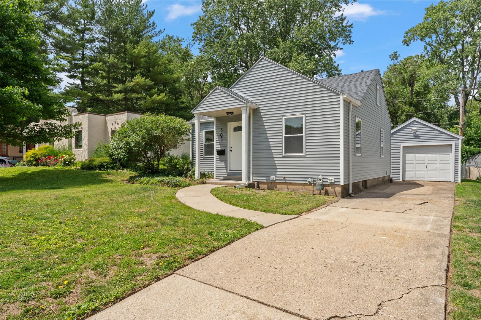 305 South Fair Street Champaign, IL 61821 - Photo 36 of 41 a front view of a house with garden